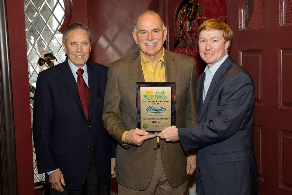 State Agriculture Commissioner Adam Putnam presents the “Century of Excellence” award to Columbia fourth generation owner Richard Gonzmart, joined by former governor Bob Martinez. The award, part of the Fresh from Florida campaign, marks the Columbia's use of state produce and the upcoming menu for Gonzmart’s new restaurant, Ulele.